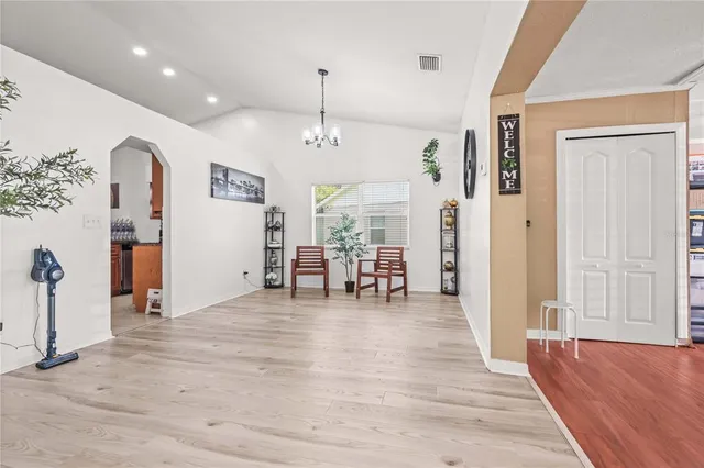 a view of a livingroom with a flat screen tv and furniture