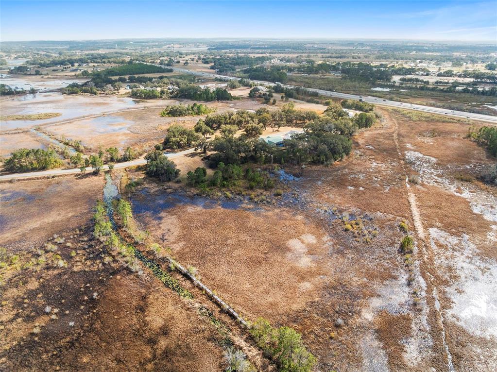 446 Long And Winding Road Howey-in-the-Hills, FL 34737 - Photo 13 of 32 a view of a city with ocean view