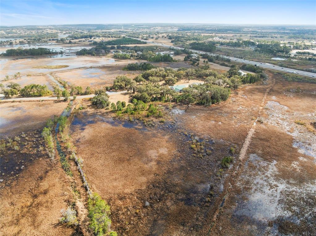 446 Long And Winding Road Howey-in-the-Hills, FL 34737 - Photo 14 of 32 a view of an ocean and beach