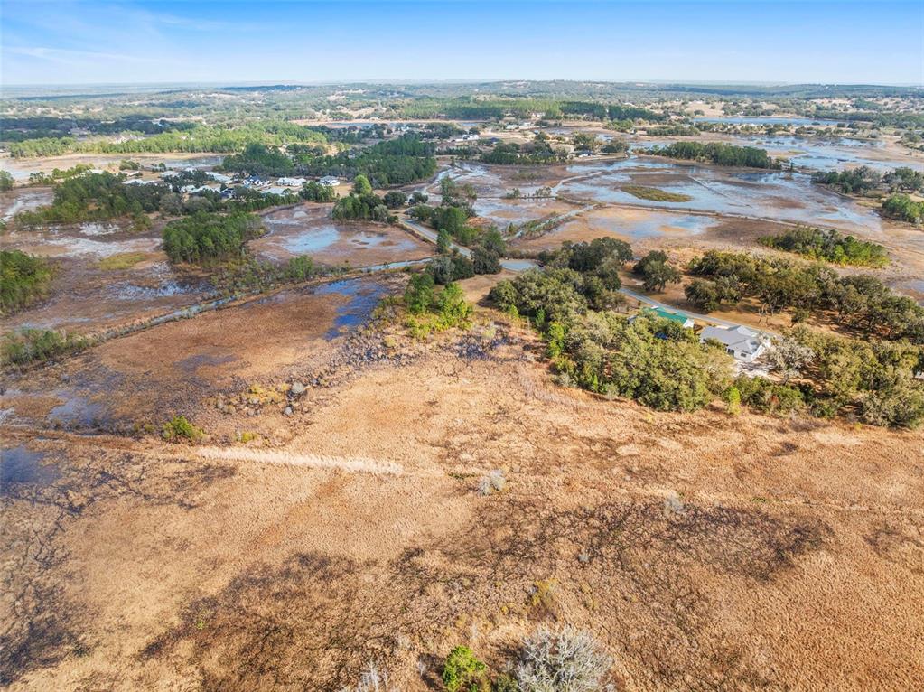 446 Long And Winding Road Howey-in-the-Hills, FL 34737 - Photo 17 of 32 a view of city and ocean