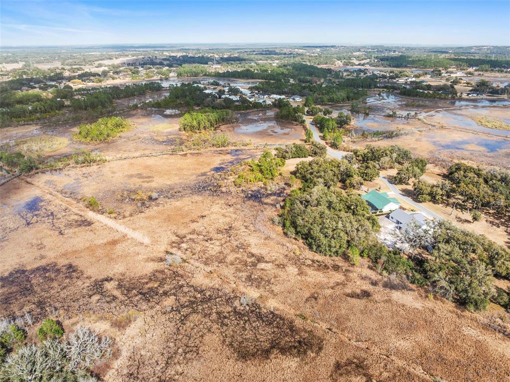 446 Long And Winding Road Howey-in-the-Hills, FL 34737 - Photo 18 of 32 a view of a city with ocean view