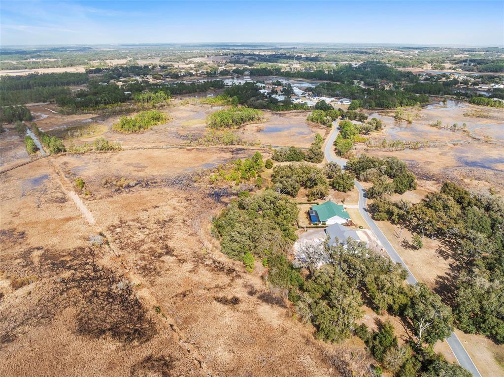 446 Long And Winding Road Howey-in-the-Hills, FL 34737 - Photo 19 of 32 a view of city and ocean