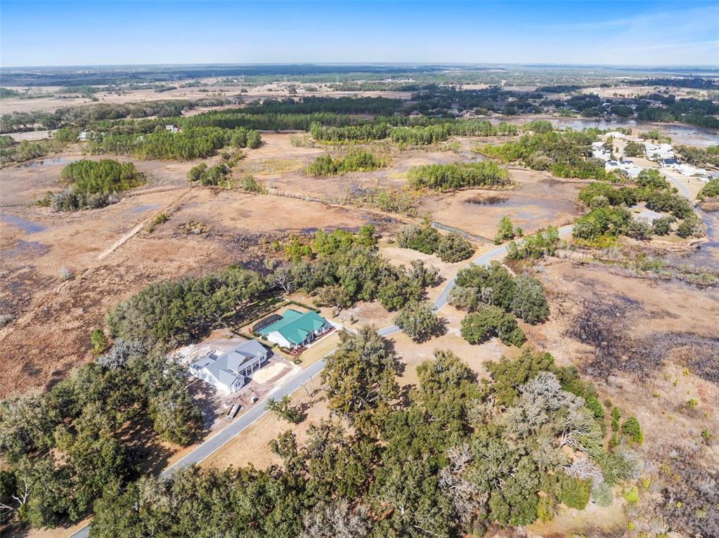 446 Long And Winding Road Howey-in-the-Hills, FL 34737 - Photo 22 of 32 a view of an ocean and beach
