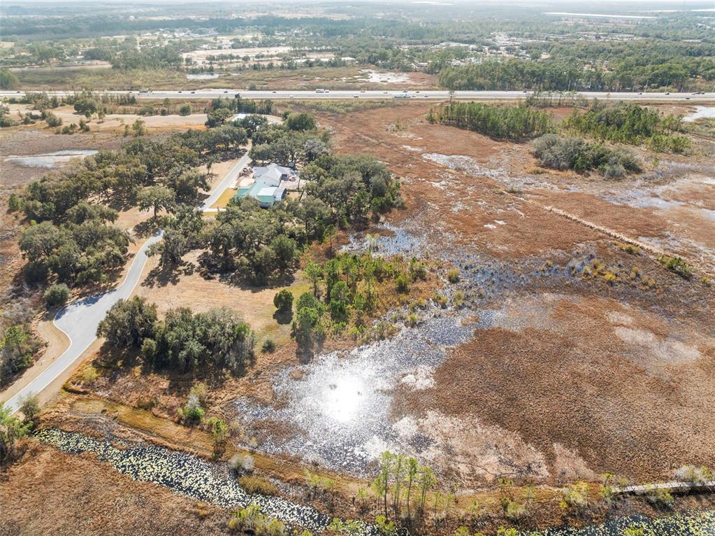446 Long And Winding Road Howey-in-the-Hills, FL 34737 - Photo 24 of 32 a view of a lake view