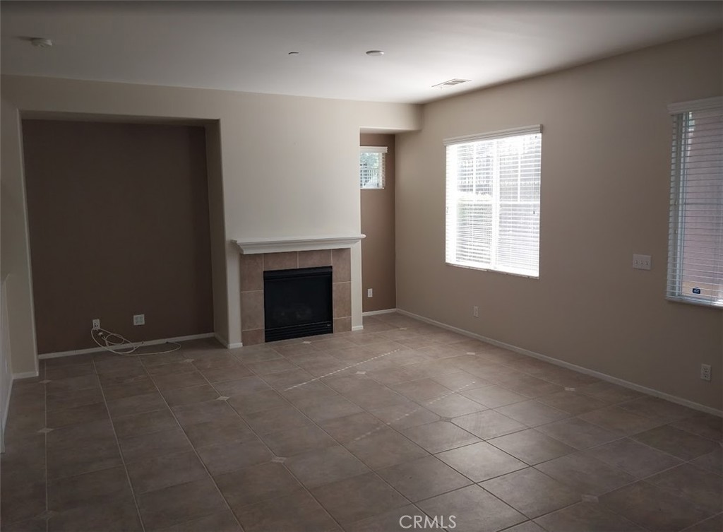 9772 Edenbrook Drive Riverside, CA 92503 - Photo 5 of 11 an empty room with windows