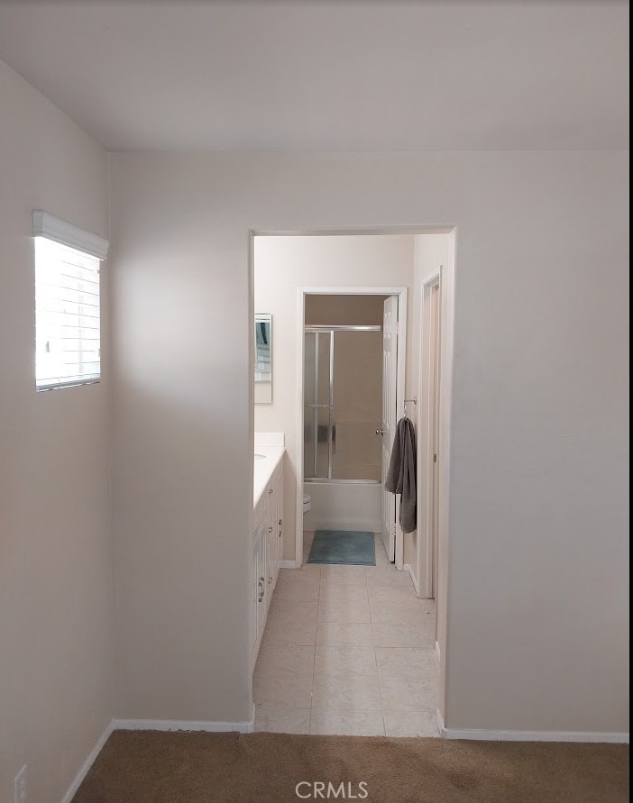 9772 Edenbrook Drive Riverside, CA 92503 - Photo 8 of 11 a view of a room that has a window