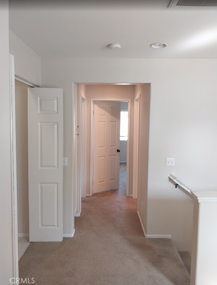 9772 Edenbrook Drive Riverside, CA 92503 - Photo 10 of 11 a view of a room with a wardrobe space