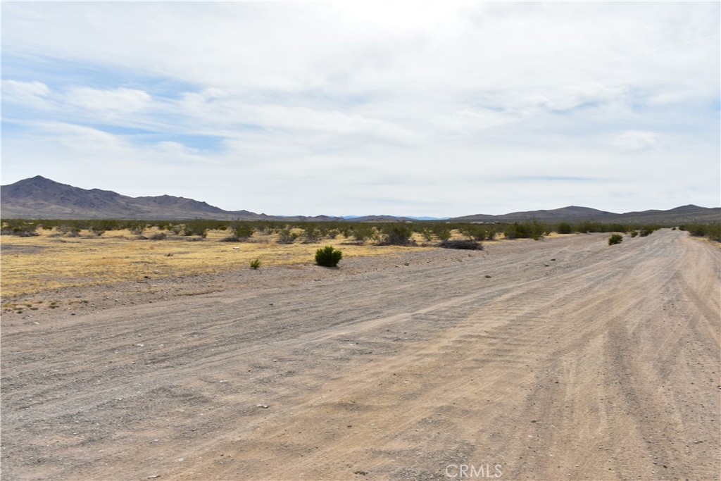 0 Frontier Road Helendale, CA 92342 - Photo 4 of 9 a view of an ocean beach and mountain