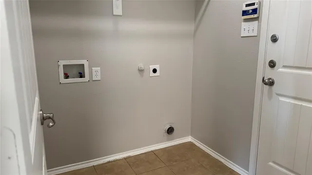 a view of a room with windows and chandelier