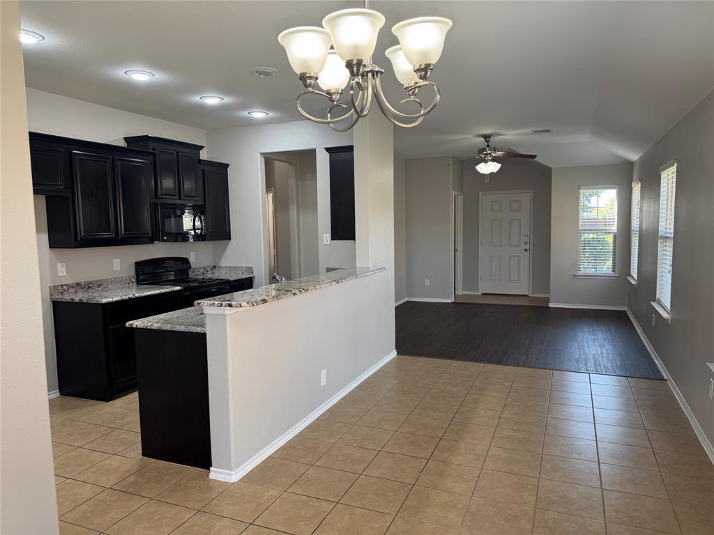 117 Chalk Road Anna, TX 75409 - Photo 3 of 32 a kitchen with a cabinets and appliances