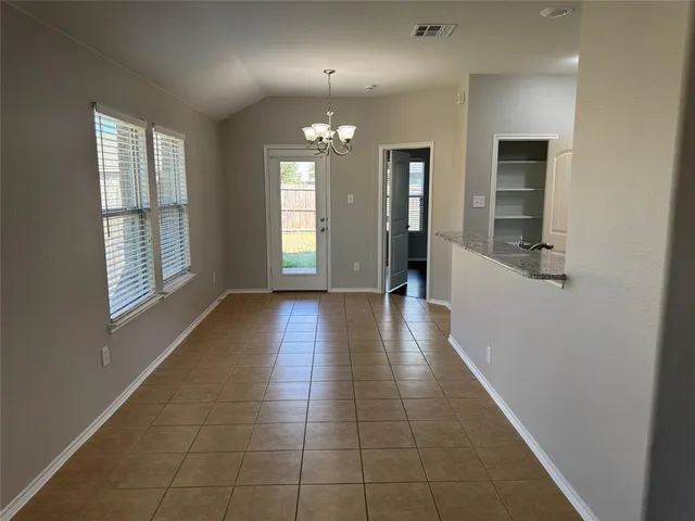 a view of livingroom with hardwood floor and hallway