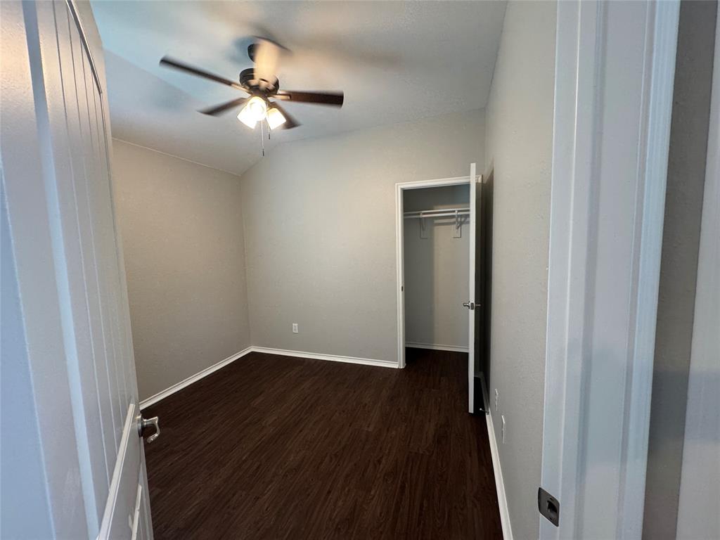 117 Chalk Road Anna, TX 75409 - Photo 10 of 32 a view of an empty room with wooden floor