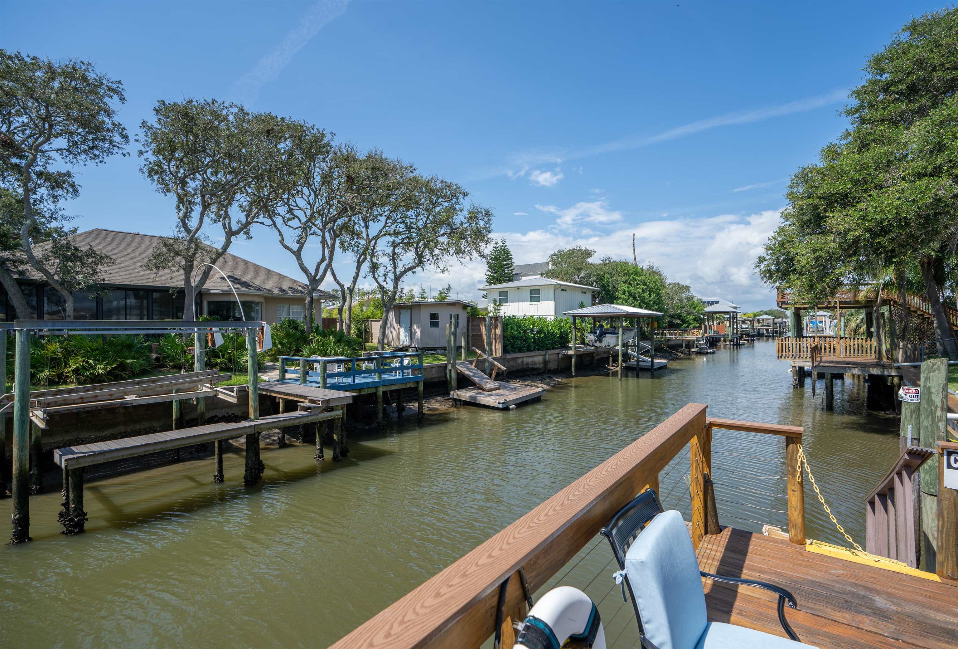 231 Ventura Road St. Augustine, FL 32080 - Photo 12 of 47 a view of swimming pool with outdoor seating and lake view