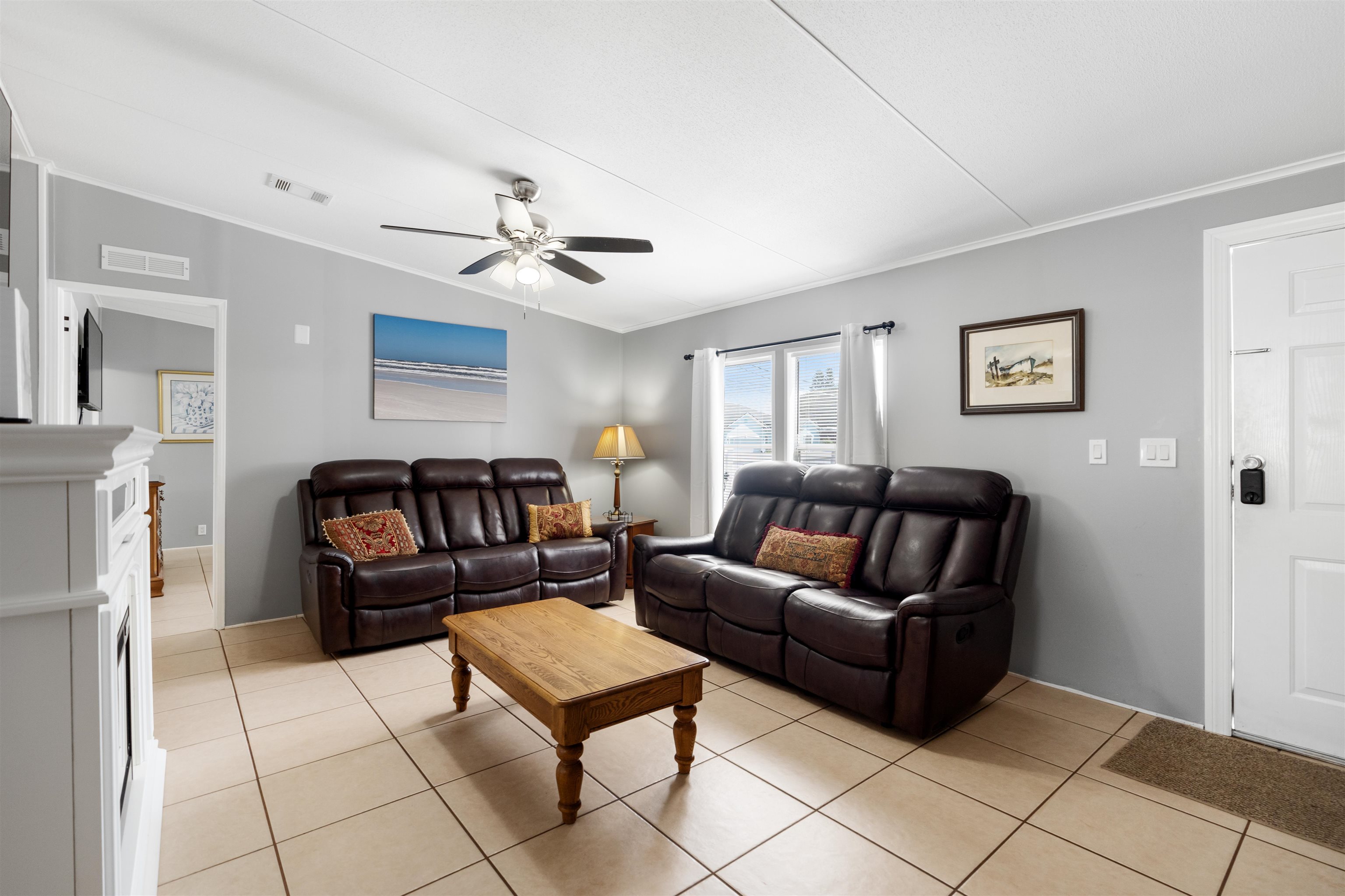 231 Ventura Road St. Augustine, FL 32080 - Photo 21 of 47 a living room with furniture and a chandelier