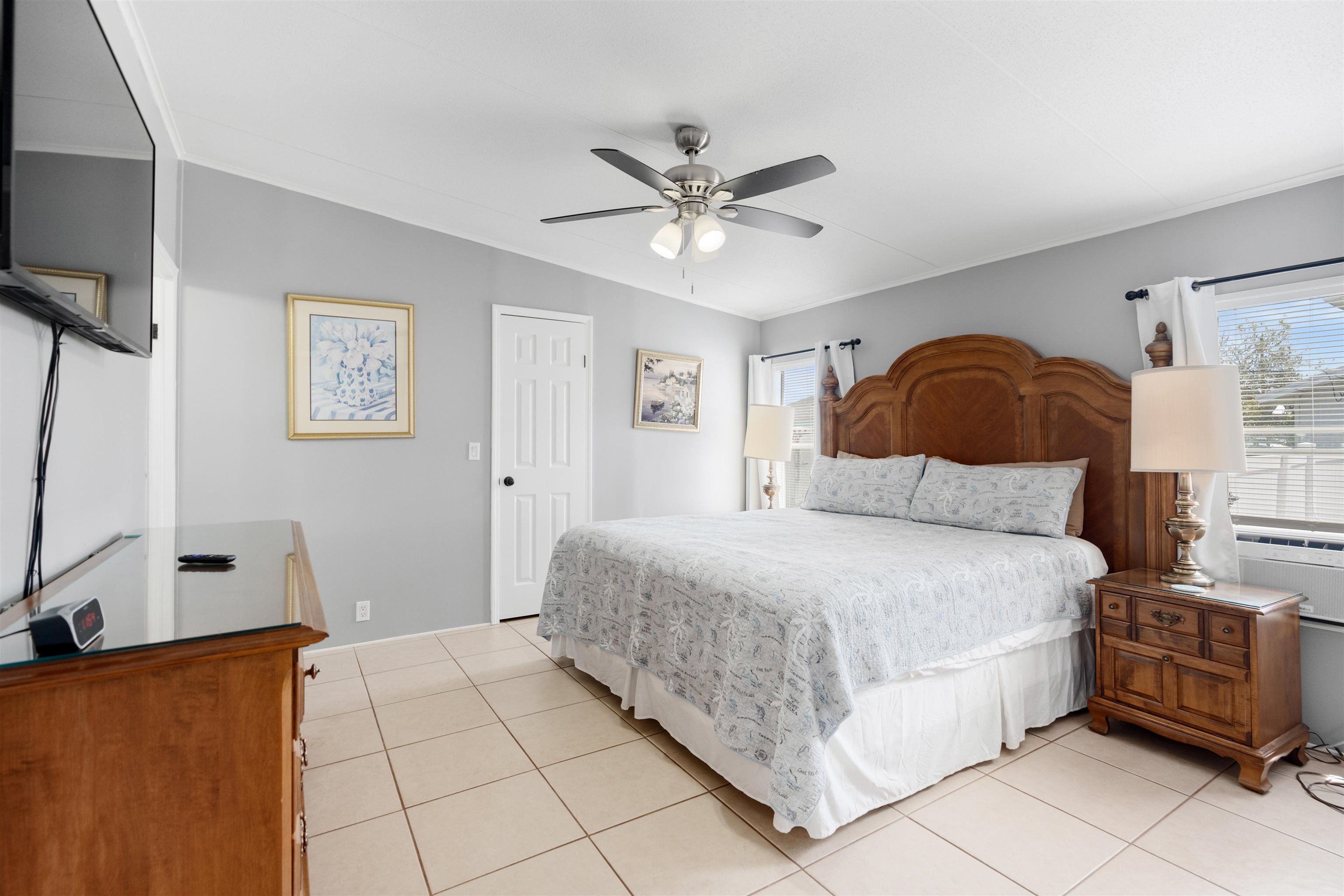 231 Ventura Road St. Augustine, FL 32080 - Photo 35 of 47 a bedroom with a bed and a chandelier