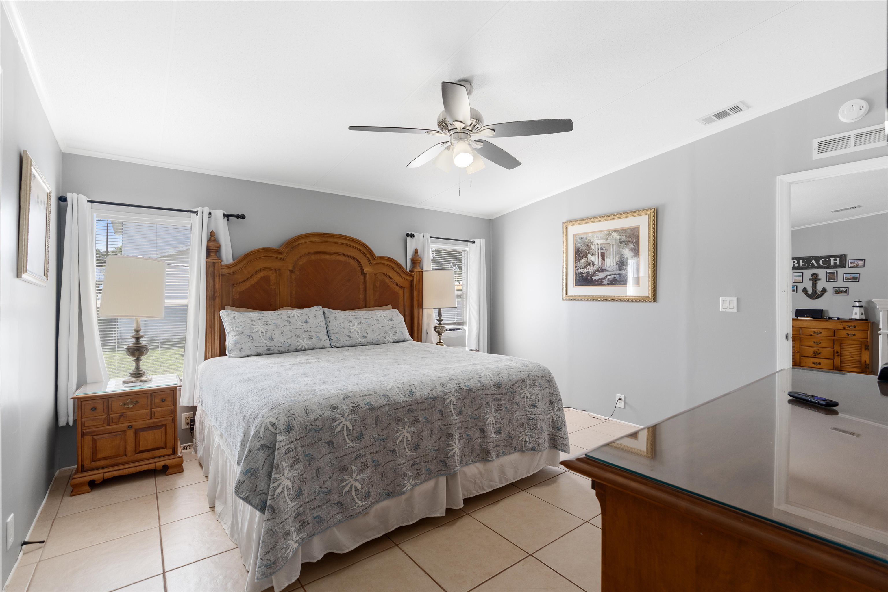 231 Ventura Road St. Augustine, FL 32080 - Photo 36 of 47 a bedroom with a bed and wooden floor