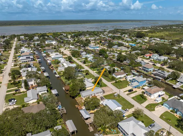 an aerial view of residential building with parking space
