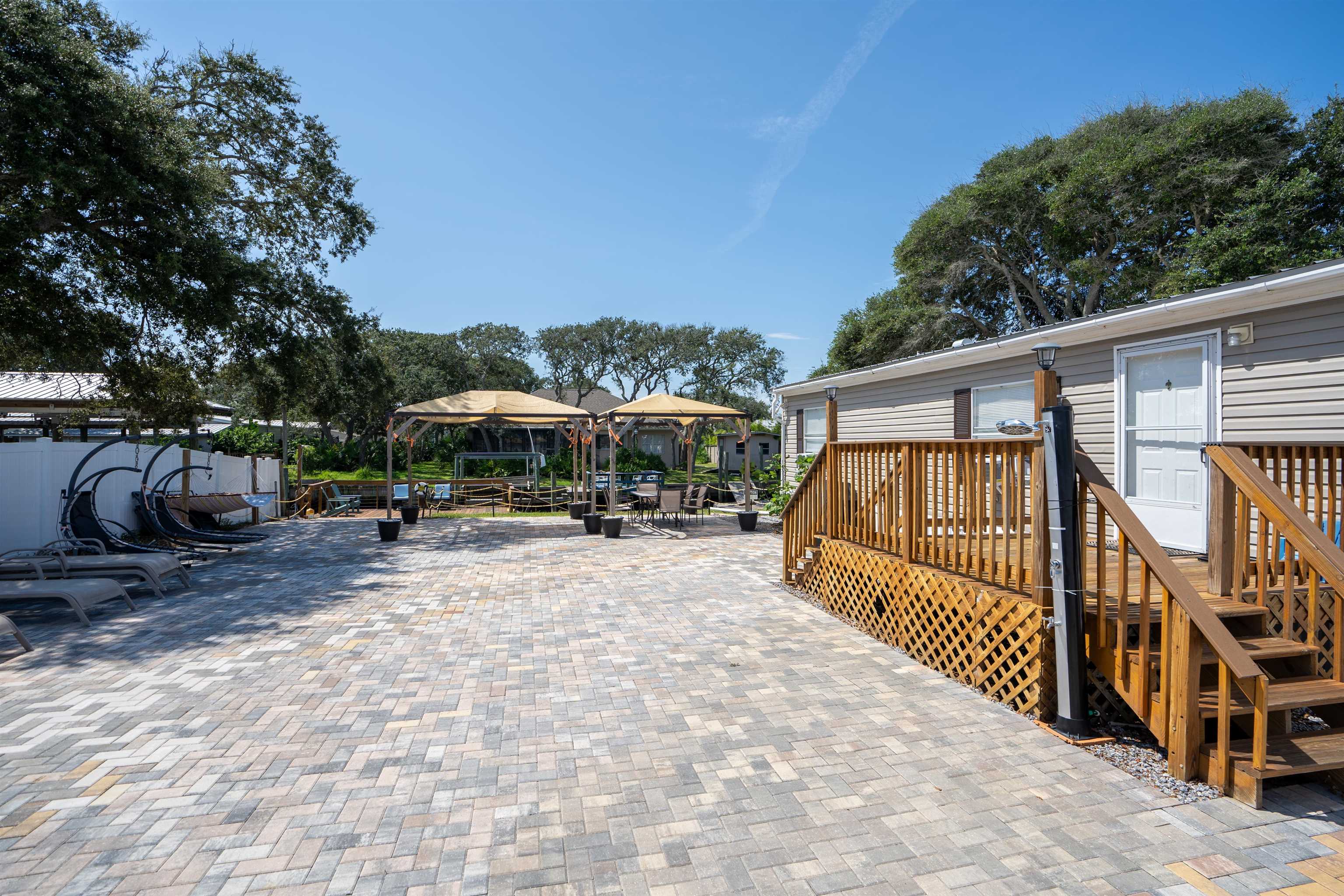 231 Ventura Road St. Augustine, FL 32080 - Photo 6 of 47 a view of a house with backyard and sitting area