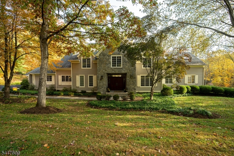 2 Cobblefield Road Mendham, NJ 07945 - Photo 2 of 50 a front view of a house with a garden