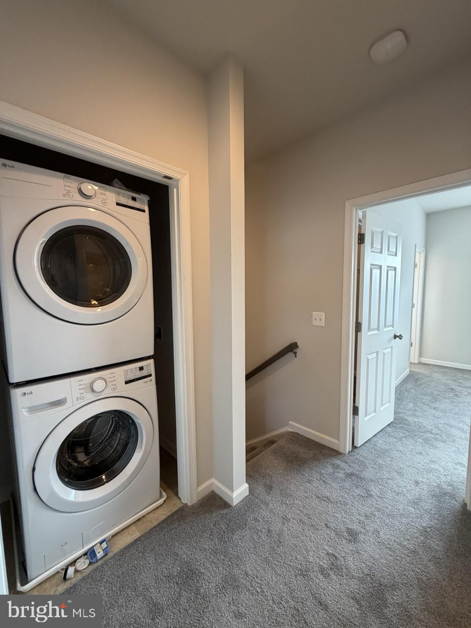 146 Galaxy Place Stephenson, VA 22656 - Photo 32 of 46 a view of a hallway with washer and dryer