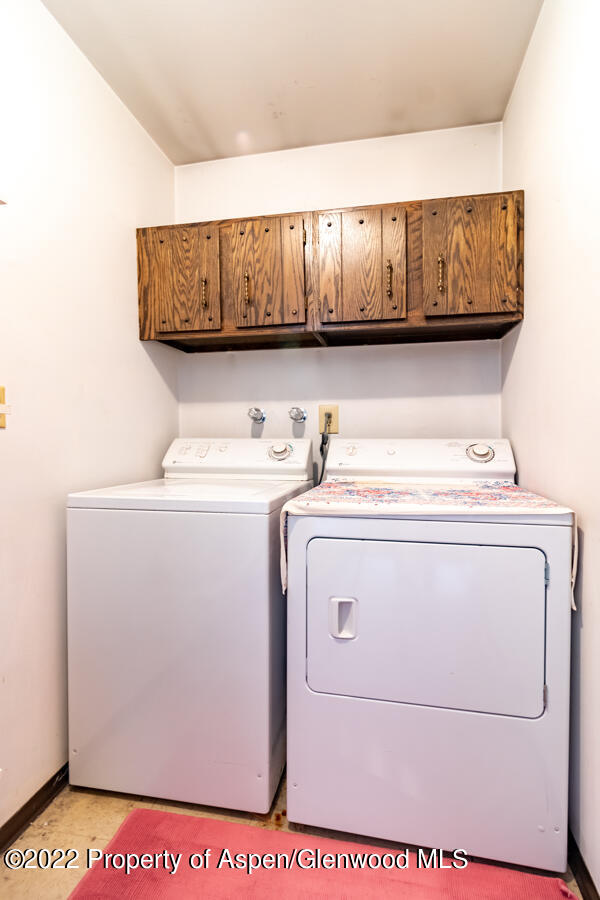 341 Clarkson Avenue Rifle, CO 81650 - Photo 7 of 16 a utility room with dryer and washer