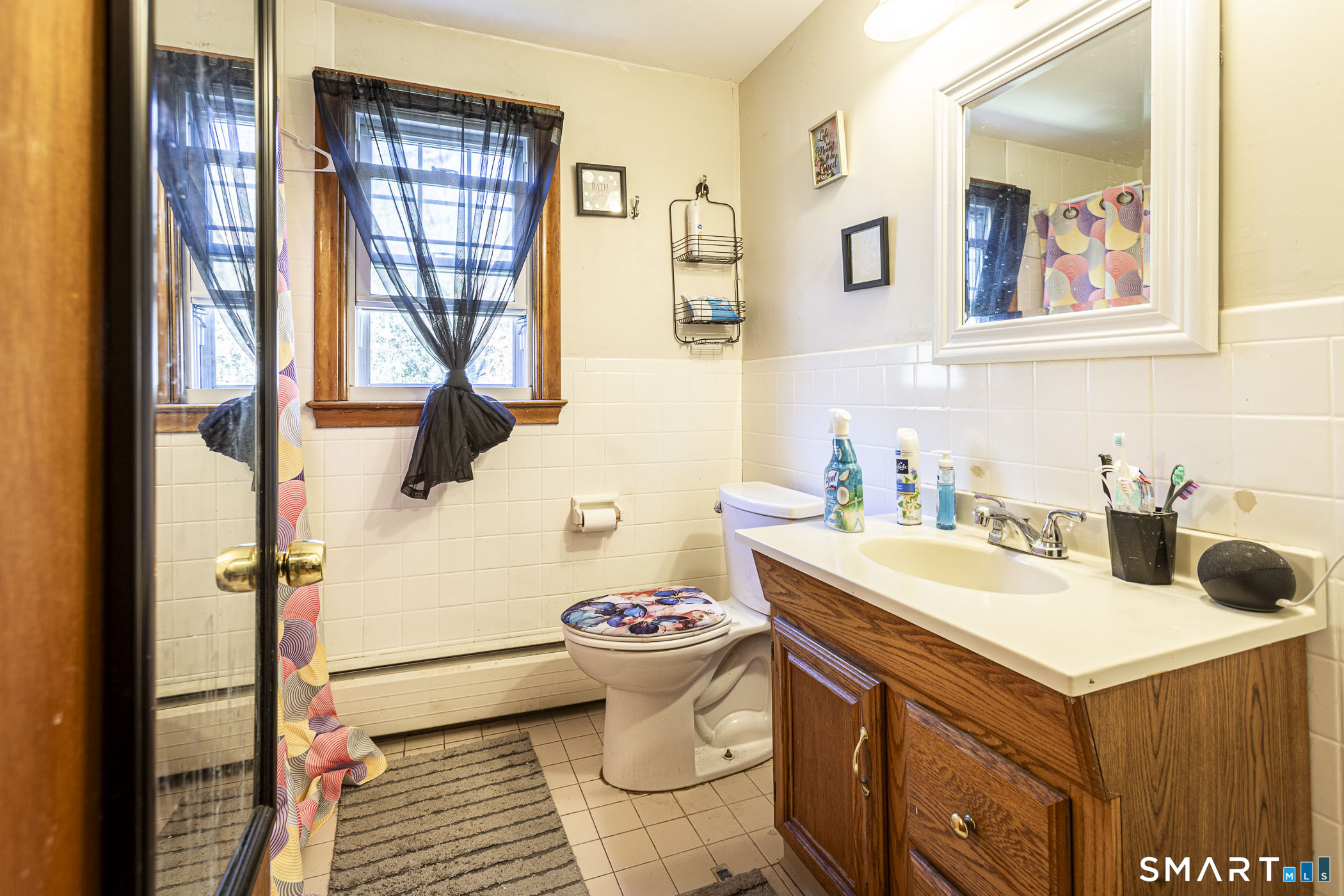 146 Union Street Manchester, CT 06042 - Photo 27 of 27 a bathroom with a sink and a toilet