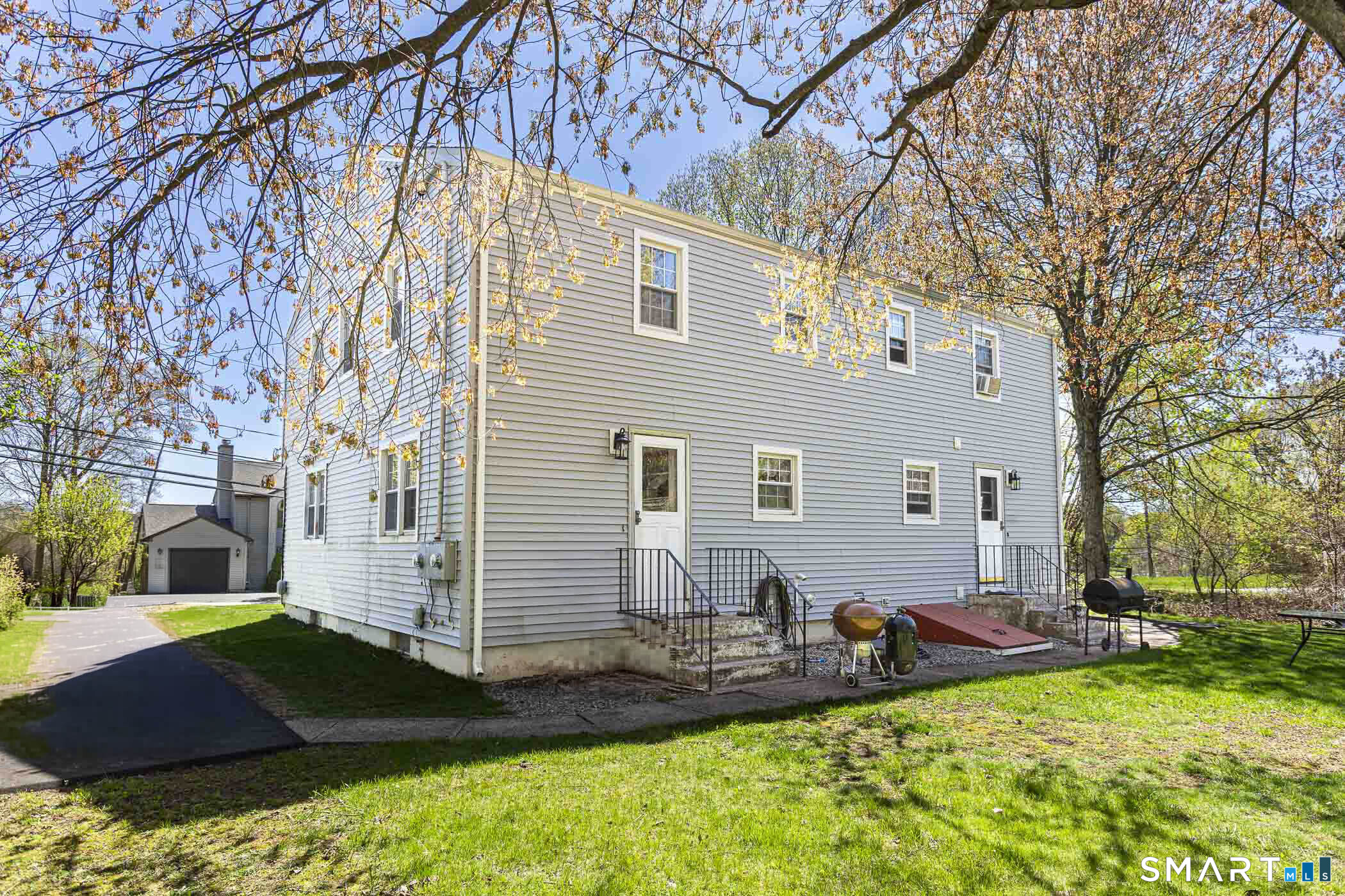 146 Union Street Manchester, CT 06042 - Photo 3 of 27 a view of house with yard