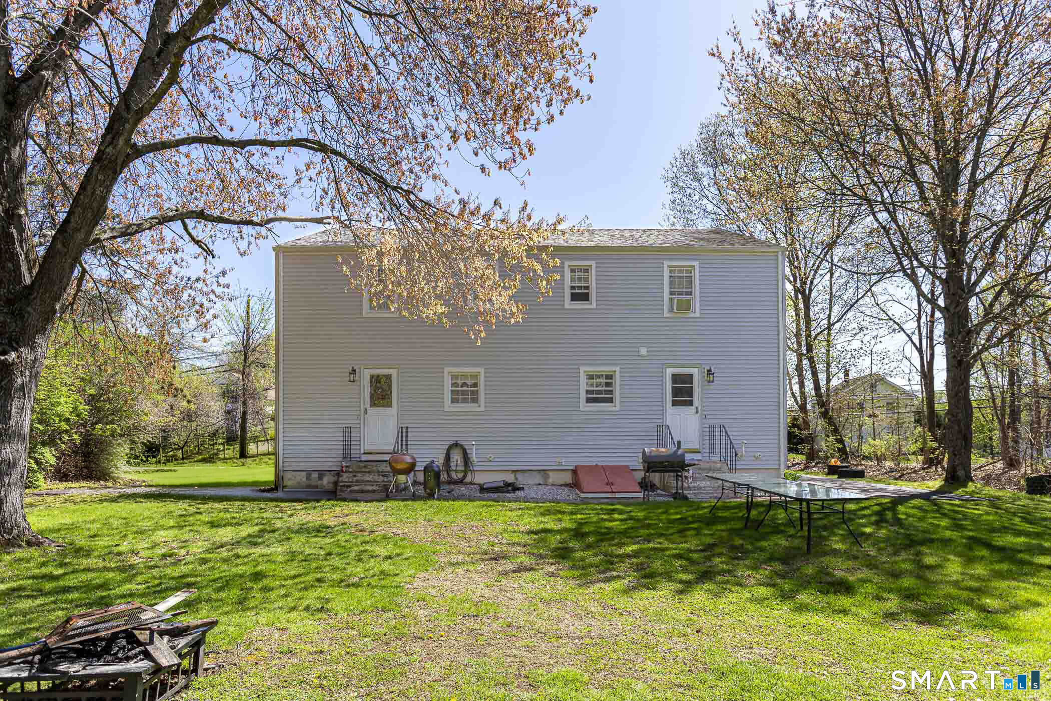 146 Union Street Manchester, CT 06042 - Photo 4 of 27 a front view of house with yard and entertaining space