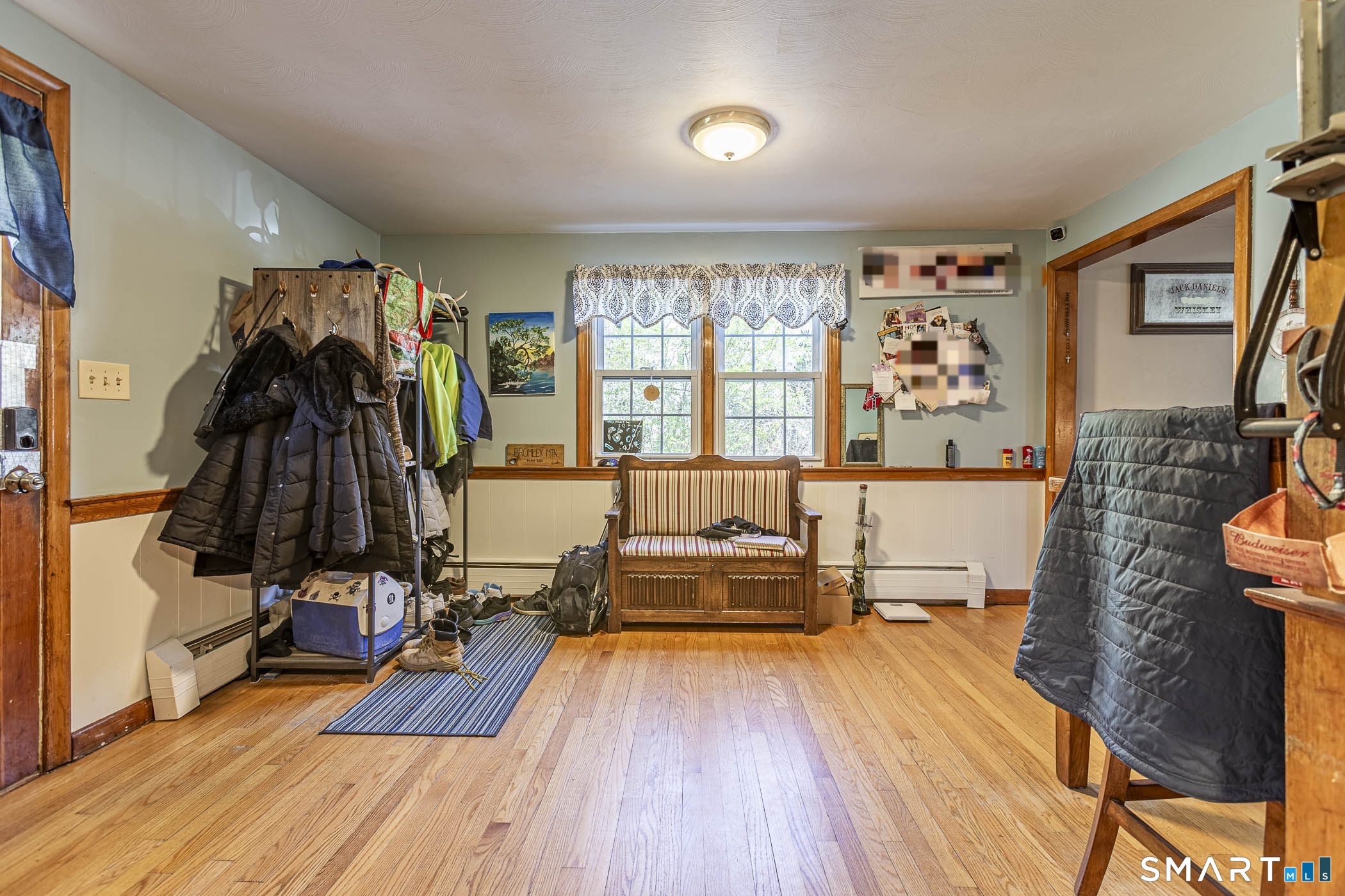 146 Union Street Manchester, CT 06042 - Photo 10 of 27 a living room with furniture and a wooden floor