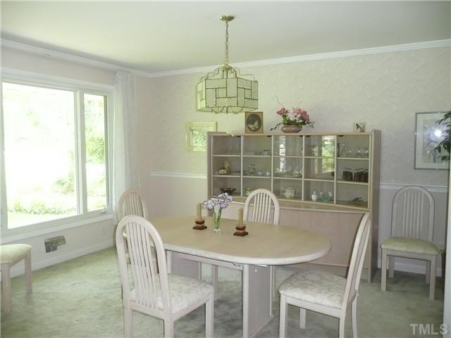 213 Bayleaf Drive Raleigh, NC 27615 - Photo 14 of 25 Plenty of room for family dinners in this pretty dining room Dining Room