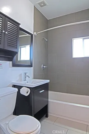 a bathroom with a sink and a bathtub