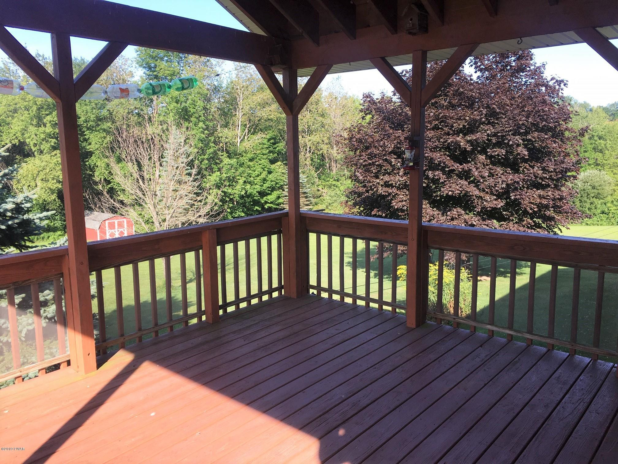 161 Tuthill Road Waymart, PA 18472 - Photo 6 of 31 a view of balcony with wooden floor