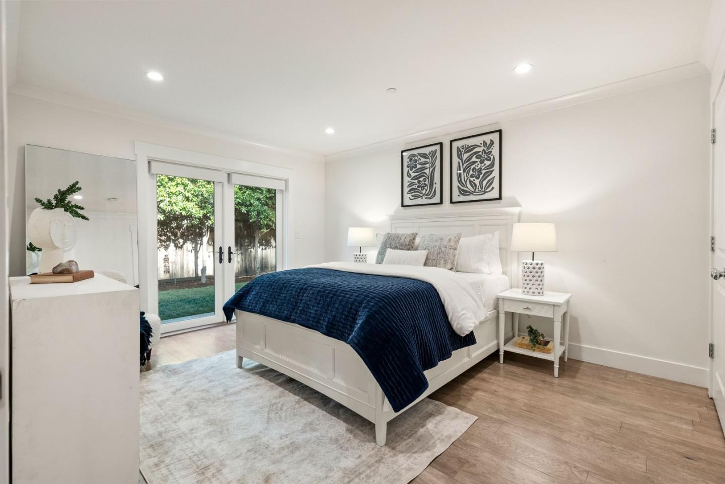 625 Kingsley Avenue Palo Alto, CA 94301 - Photo 15 of 24 a spacious bedroom with a bed and a window