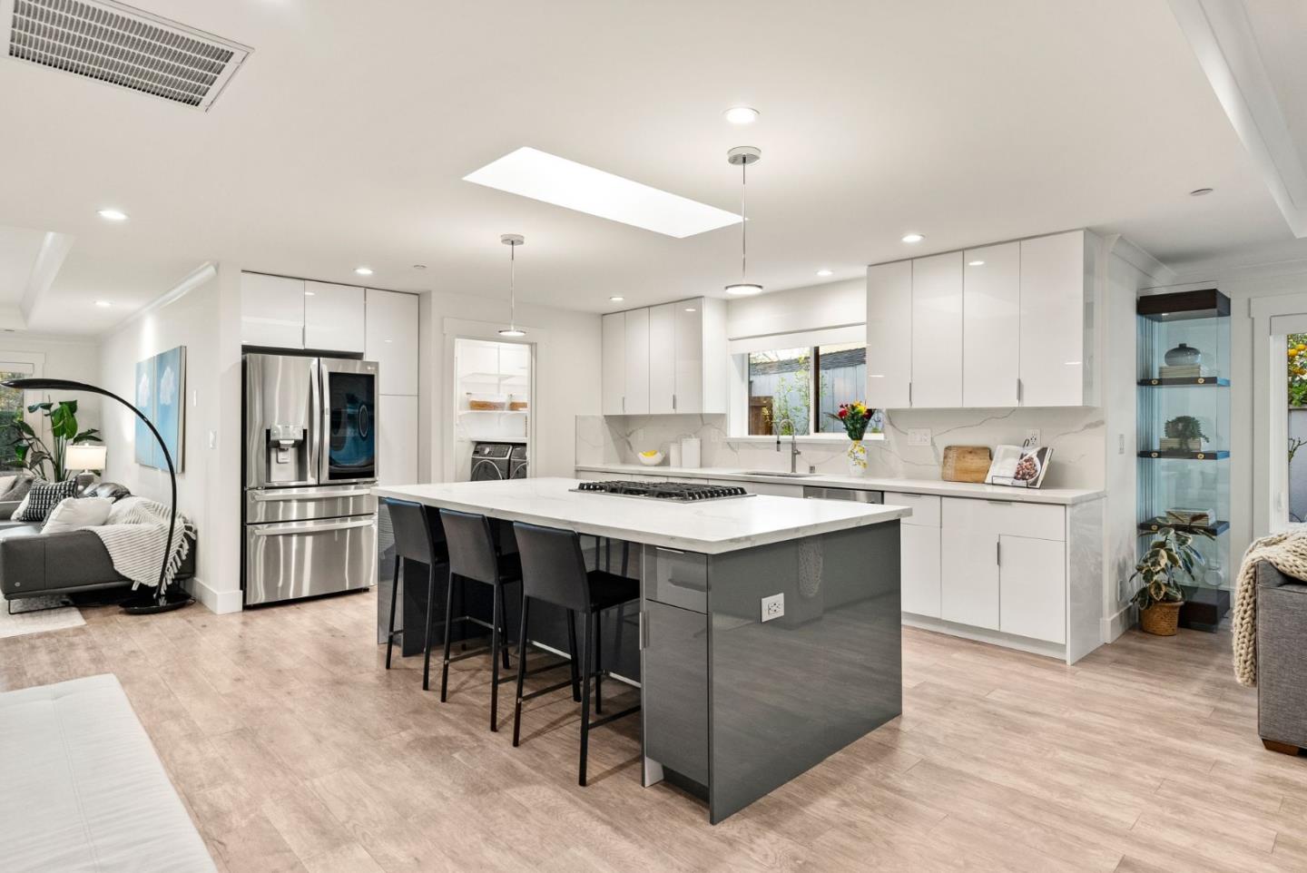 625 Kingsley Avenue Palo Alto, CA 94301 - Photo 6 of 24 a kitchen with a sink stove and cabinets