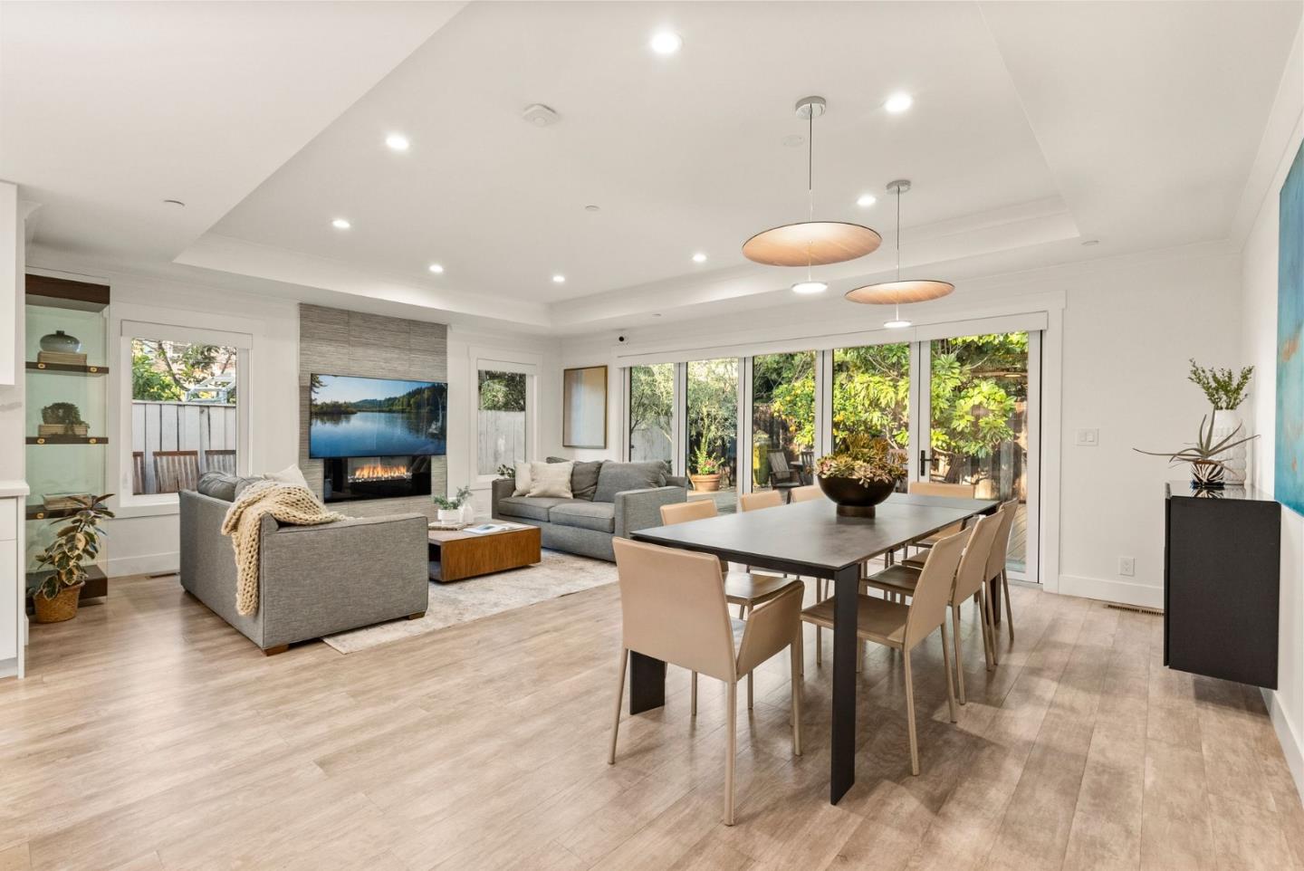 625 Kingsley Avenue Palo Alto, CA 94301 - Photo 7 of 24 a view of a dining room with furniture and wooden floor