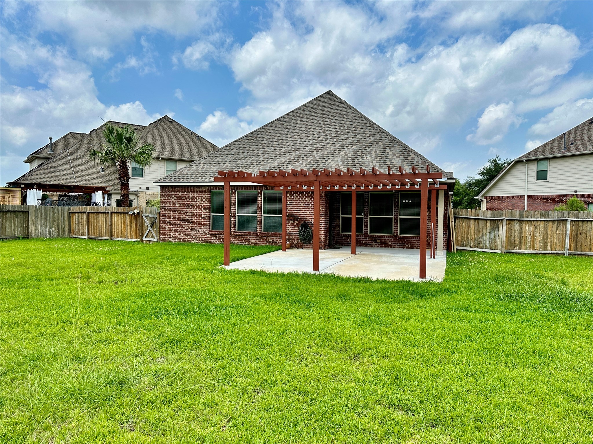 25307 Holton Ridge Drive Katy, TX 77494 - Photo 25 of 26 a view of a house with a backyard