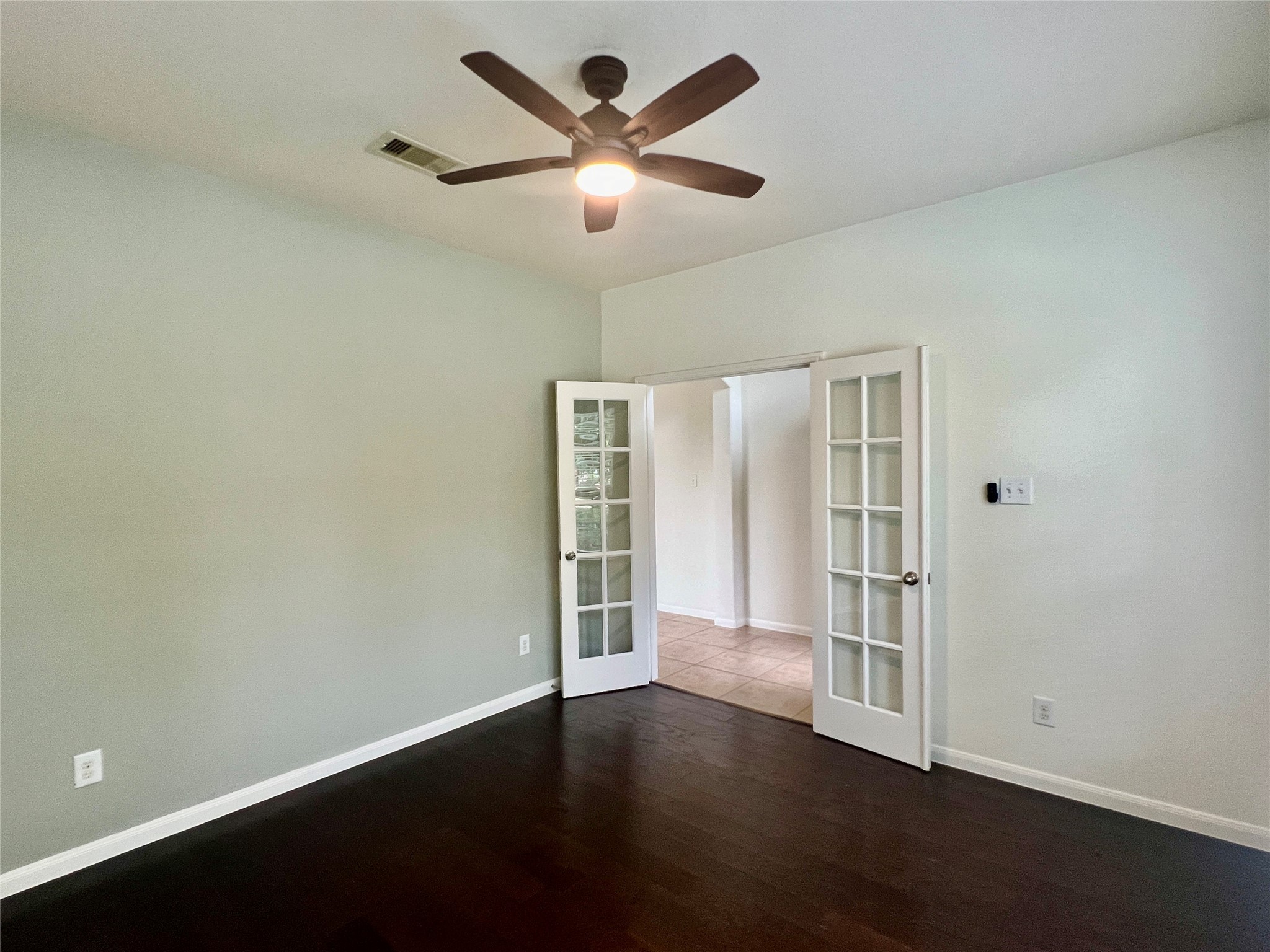 25307 Holton Ridge Drive Katy, TX 77494 - Photo 6 of 26 an empty room with wooden floor