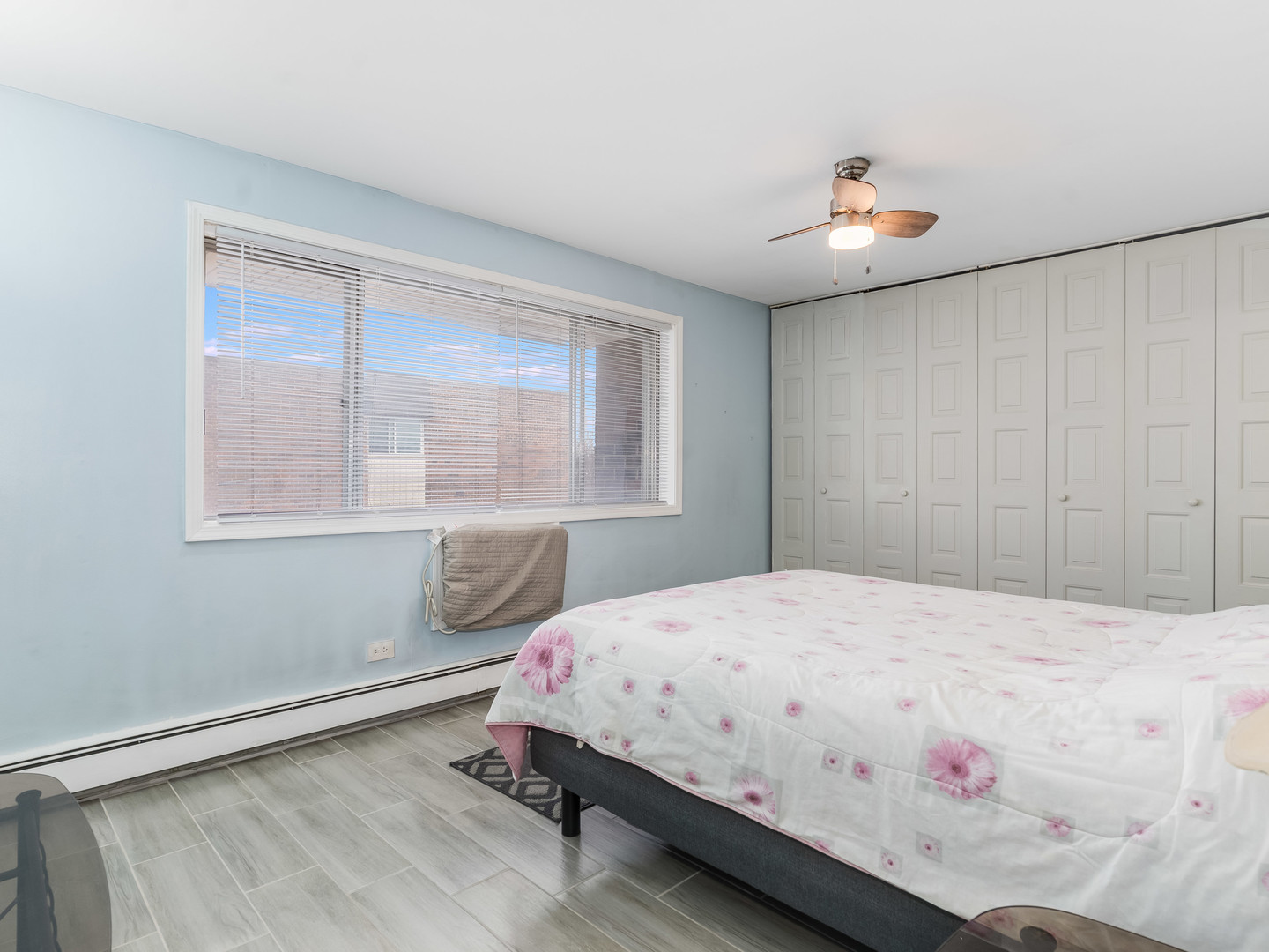 4721 St Joseph Creek Road, Unit 5F Lisle, IL 60532 - Photo 14 of 19 a bedroom with a bed and a window