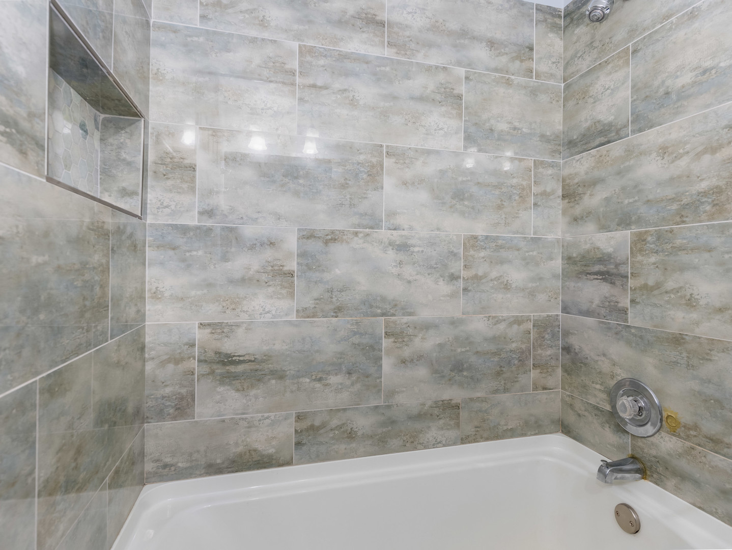 4721 St Joseph Creek Road, Unit 5F Lisle, IL 60532 - Photo 16 of 19 a bathroom with a shower