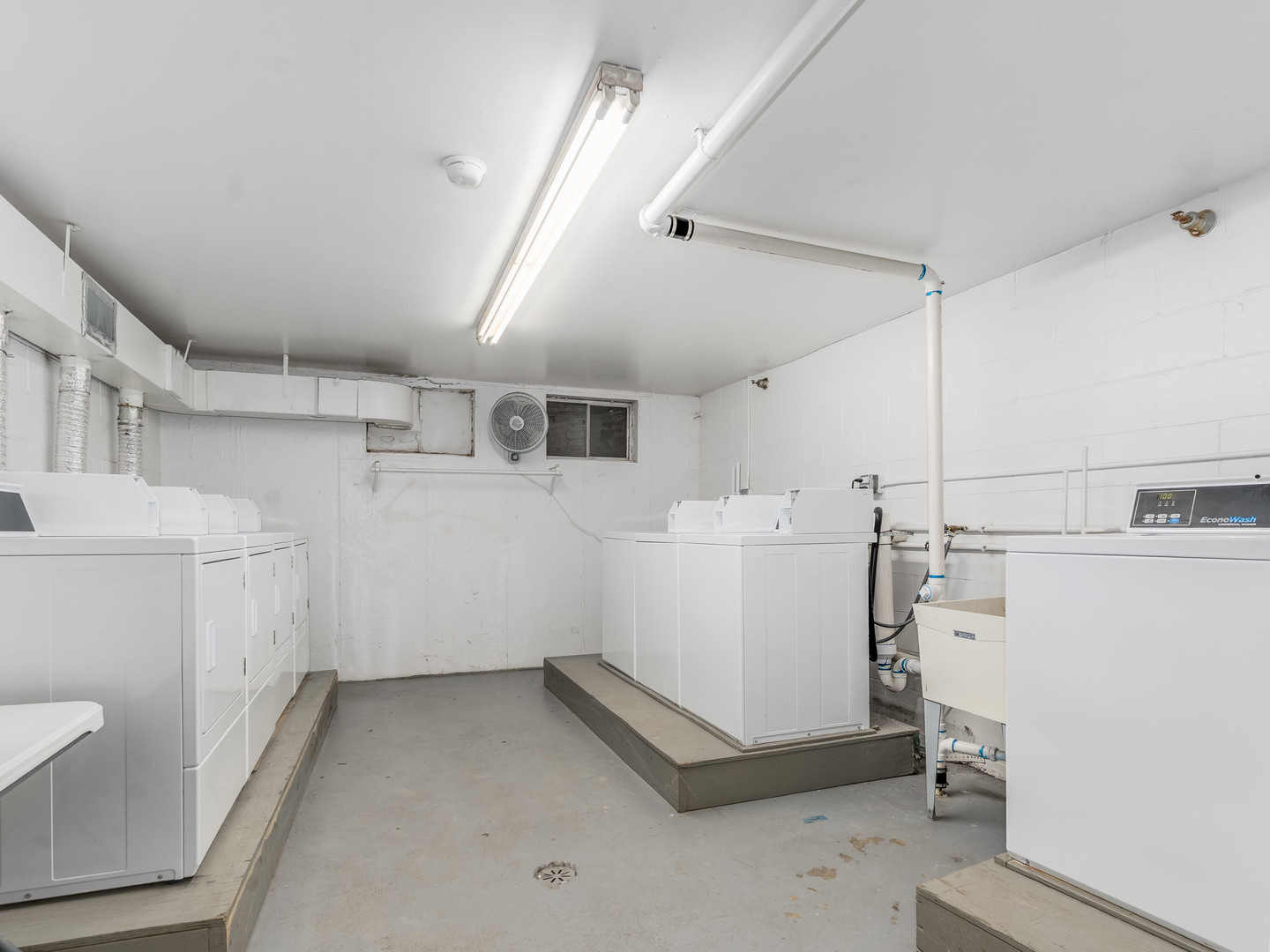 4721 St Joseph Creek Road, Unit 5F Lisle, IL 60532 - Photo 19 of 19 a utility room with cabinets