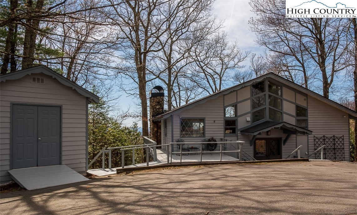 89 Rabbit Run Glade Valley, NC 28627 - Photo 1 of 32 a front view of a house with garage
