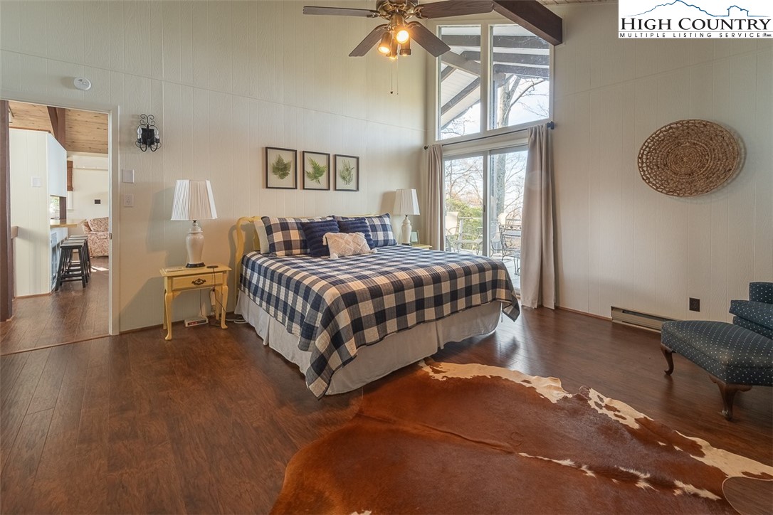 89 Rabbit Run Glade Valley, NC 28627 - Photo 16 of 32 a bedroom with a bed and window