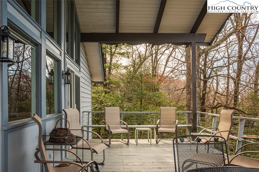 89 Rabbit Run Glade Valley, NC 28627 - Photo 29 of 32 a view of a chairs and table in the balcony