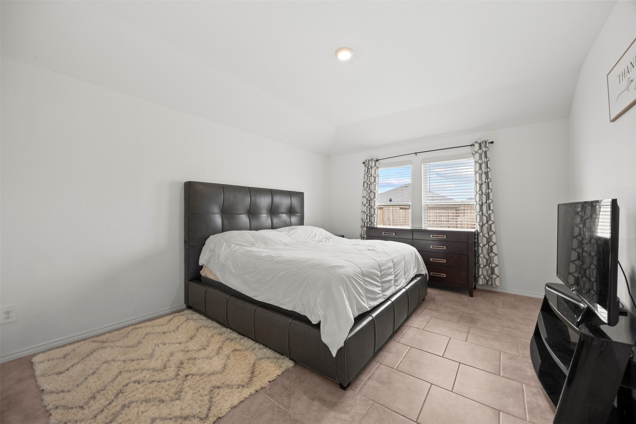 7511 Carson Court Rosharon, TX 77583 - Photo 17 of 26 Your own peaceful retreat! The generously sized primary bedroom offers room to relax and recharge.