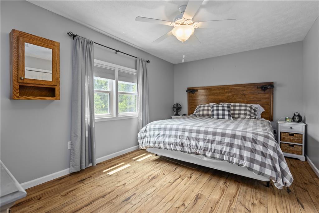 231 Hannahstown Road Cabot, PA 16023 - Photo 11 of 25 a bedroom with a bed and a window