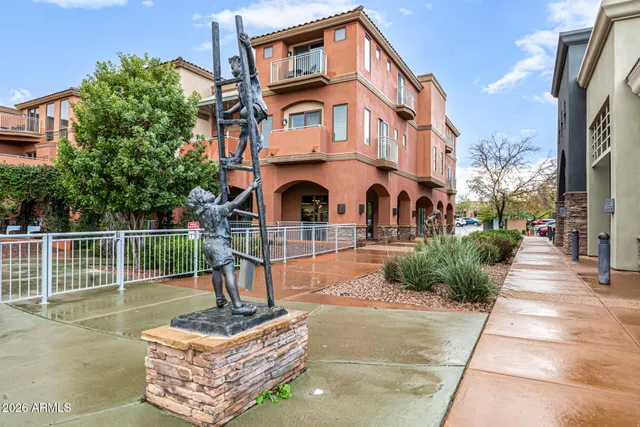 a view of a lake and with green space