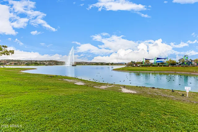 a view of a lake with a big yard