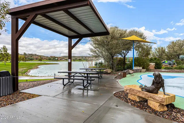 a view of a park with large trees