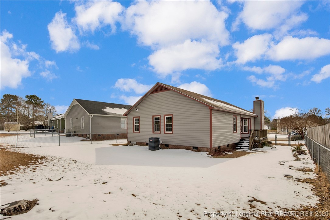 3824 Constance Road Hope Mills, NC 28348 - Photo 29 of 32 a view of a house covered in snow