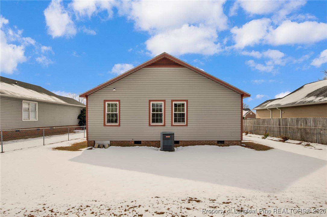 3824 Constance Road Hope Mills, NC 28348 - Photo 30 of 32 a view of a house with snow on the road